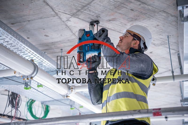 Набір 18V-SET акумуляторний комбінований Bosch Professional, складається з шурупокрута GSR 18V-45, болгарки GWS 18V-8, перфоратора GBH 18V-22, трьох акб GBA 18V 4.0Ah, зарядного GAL 18V-40, сумки M-BAG (0615A5007L) 0615A5007L фото